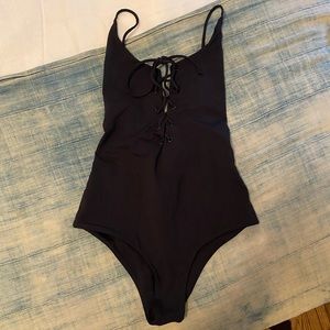 Tavik solid Monahan one piece